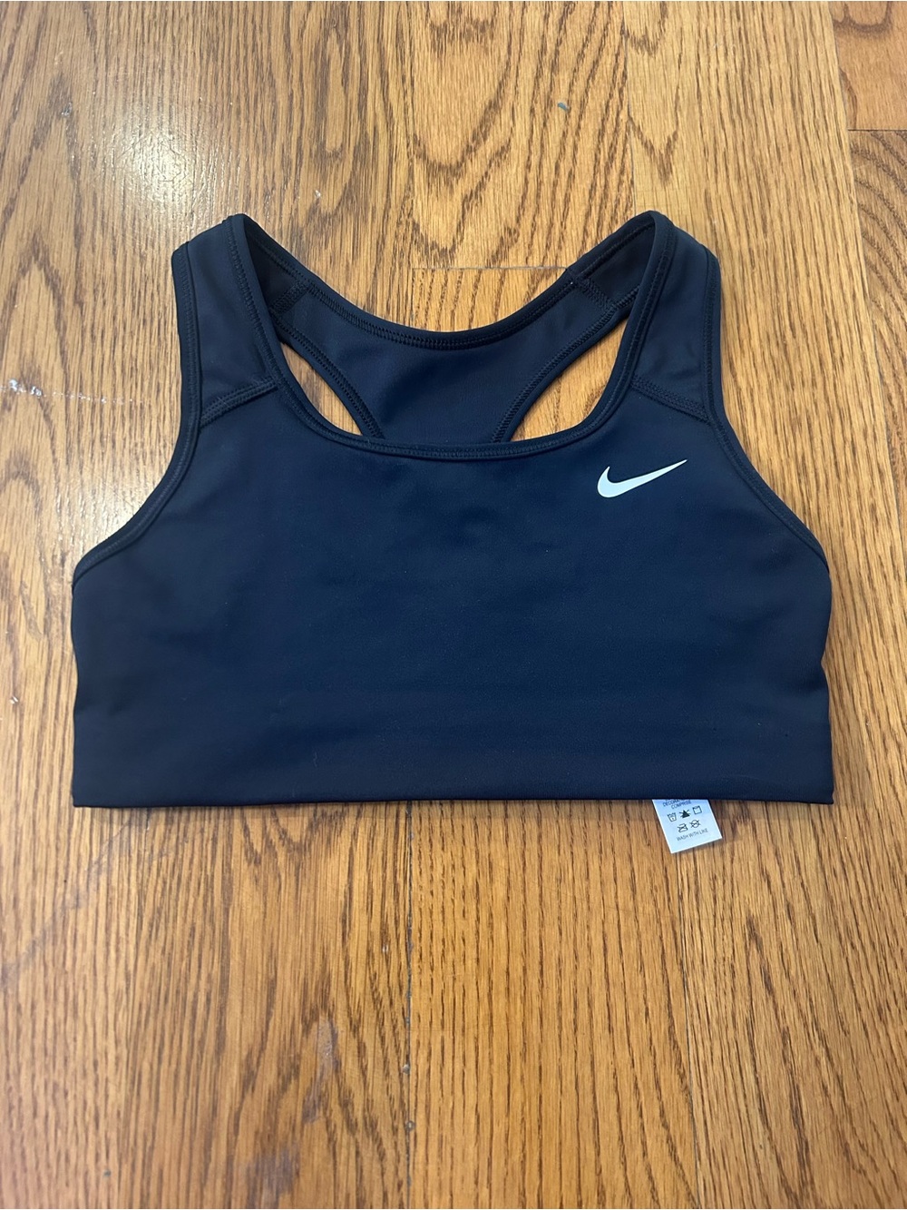 Nike Black Racerback Sports Bra with White Swoosh Accent